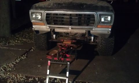1979 Ford Bronco - Front view of a 1979 Ford Bronco, showing the grille and bumper area.