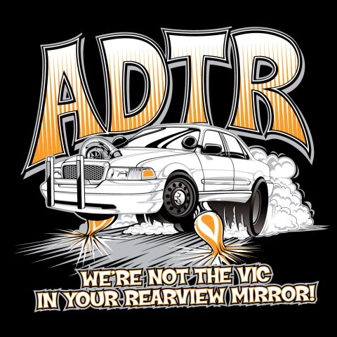 1998 Ford Crown Victoria - Cartoon artwork of a white Crown Victoria doing a smoky burnout below bold ADTR letters and a tongue-in-cheek slogan.