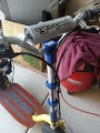 1978 Ford Bronco - Close-up of scooter handlebars and deck, with text visible on the grip.