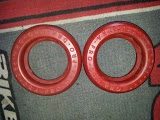 1978 Ford Bronco - Close-up of two red circular components, each bearing the inscription "PRO-Q".