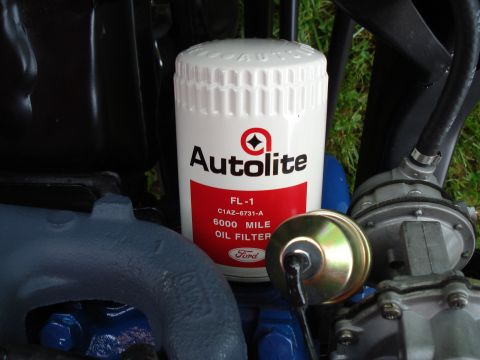 1994 Ford F-350 - Close-up of an Autolite oil filter and associated engine parts.