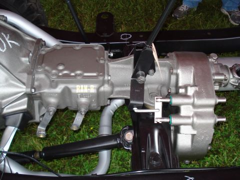 1994 Ford F-350 - The image shows a close-up view of a vehicle's powertrain components, specifically the transmission and transfer case.