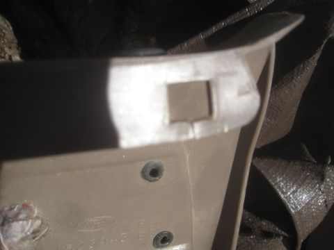 1993 Ford Bronco - Interior trim part with Ford branding, likely from a vehicle part section.