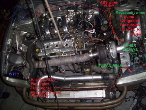 1995 Ford Probe - This engine bay features a turbocharger and extensive custom wiring, with various components labeled for identification.