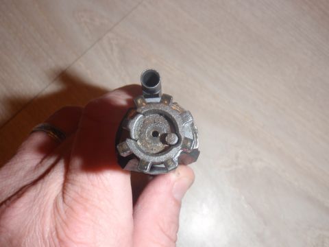 2000 Dodge 1500 - A close-up view of a metal component, possibly from a mechanical assembly.