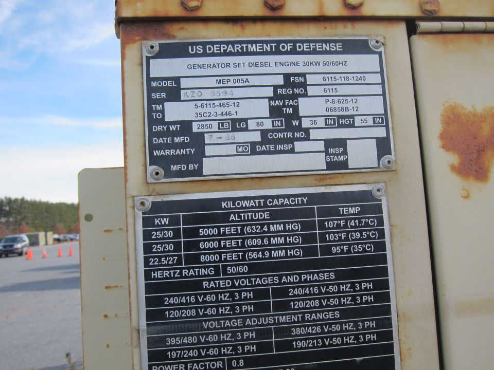 US Department of Defense data plate for a 30kW diesel generator set listing model, kilowatt capacity, and voltage ranges.