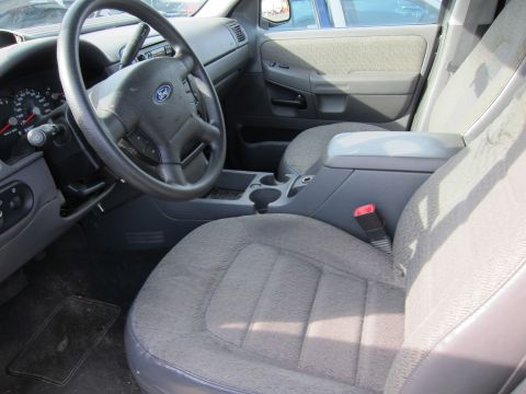 1991 Ford LTD Crown Victoria - Interior of a 2002 Ford Explorer, the driver's seat and dashboard.