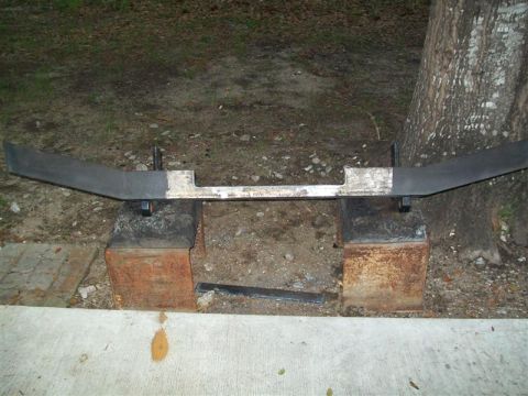 1982 Ford F-100 - Front bumper assembly, likely for a truck, shown outdoors.