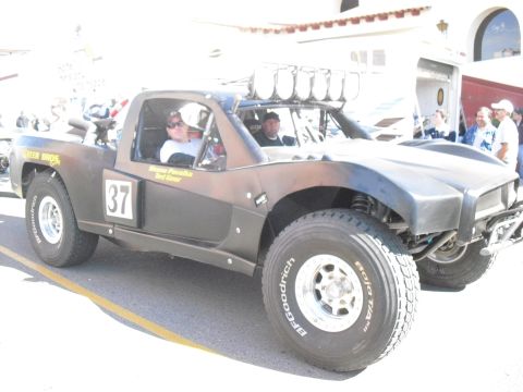 1986 Ford Bronco - Off-road race truck with "GREEN BROS" and "Moore Parolla" text visible on the door.