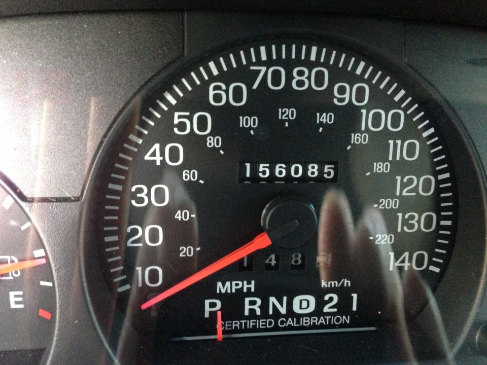 2001 Ford Crown Victoria odometer showing 156085 miles and speedometer at 10 mph.