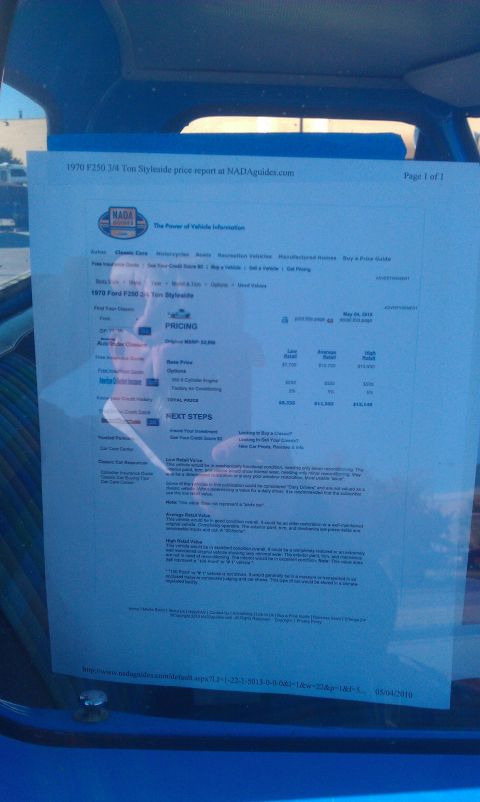 1973 Ford F-100 - A price report for a 1970 Ford F250 Styleside is visible inside a blue vehicle.