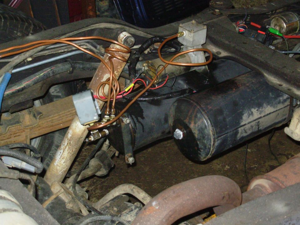 It finally occurred to me that the pressure switch wouldn't work if it was attached to one compressor, so I moved it.  I also figured out how to make the check valves actually work right, so the system is ready for any extra compressors I feel like installing.  This one takes about 10min to go from 0 to 144psi.