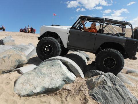 1979 Ford Bronco - A 1979 Ford Bronco tackles a challenging rocky obstacle course in the desert.
