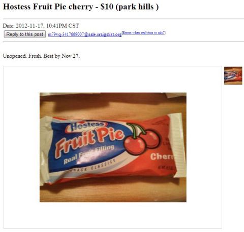 2007 Dodge Durango - A Hostess Fruit Pie cherry snack cake is shown on a wooden surface.