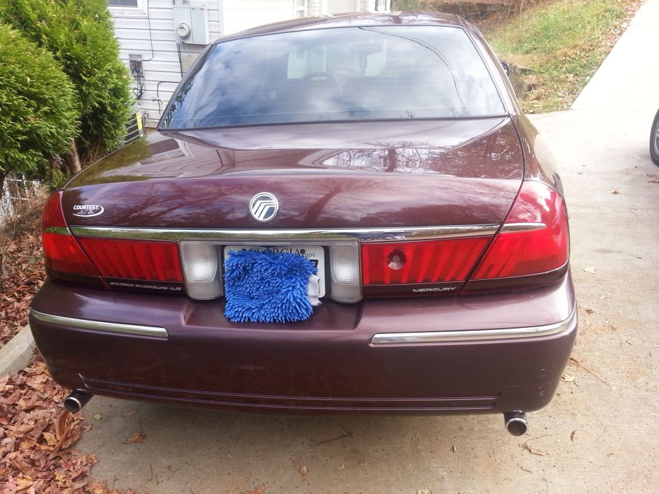Maroon 2001 Mercury Grand Marquis rear view with 'Grand Marquis LS' badging