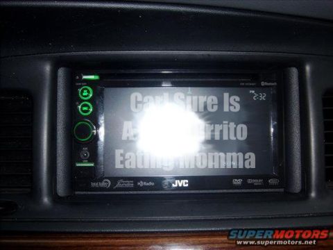 1971 Ford Ranchero - The JVC infotainment system screen displays a humorous message and the current time.
