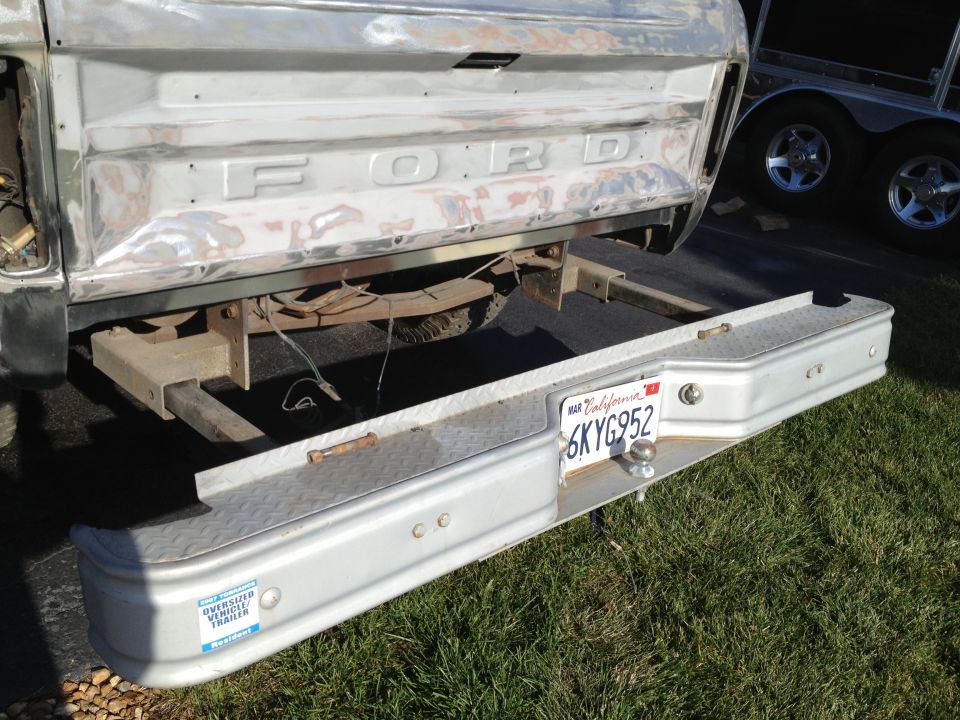 Rear of a 1979 Ford F-350 truck, showing the tailgate with 'FORD' lettering and a step bumper with a California license plate