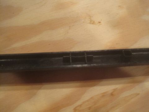 1993 Ford Bronco - This black plastic trim piece features clips for attachment and a Supermotors.net logo in the corner.