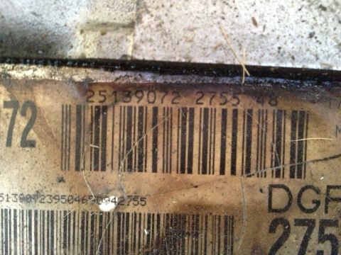 1999 BMW 5 Series - Close-up of a part label with visible barcodes and identifying numbers.