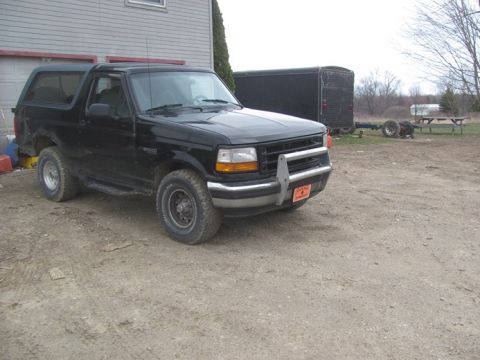 1996 Ford Bronco - This black 1996 Ford Bronco is shown in a 3/4 front view, equipped with a brush guard.