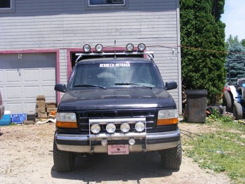 1996 Ford Bronco - This 1996 Ford Bronco is equipped with a bull bar, auxiliary lights, and a roof rack.