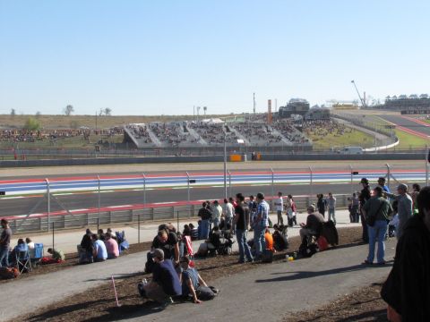 2006 BMW 5 Series - Spectators watch a race from the grandstands and trackside at the Circuit of the Americas.