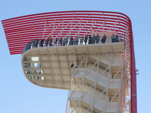 2006 BMW 5 Series - The observation tower at the Circuit of the Americas features a distinctive red and white striped overhang and a viewing platform crowded w…