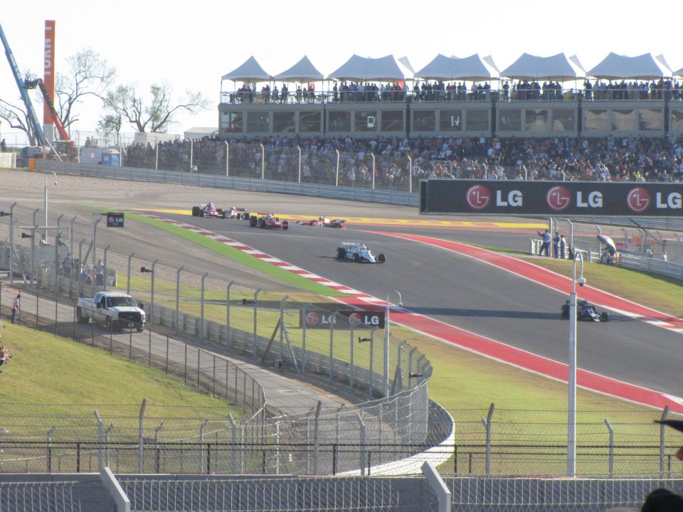 Formula 1 race cars on track with LG signage