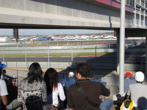 2006 BMW 5 Series - View of a race track and surrounding facilities from the spectator stands.