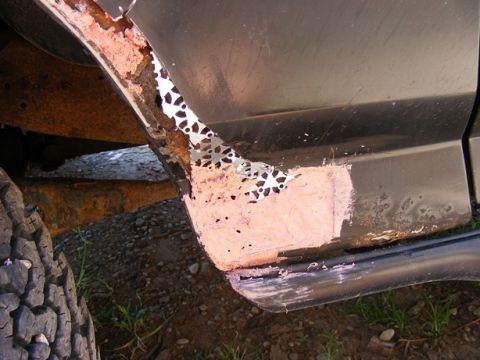 1996 Ford Bronco - This vehicle shows significant rust and body repair in the wheel well area.