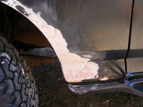 1996 Ford Bronco - Repairing rust and body damage on the rear quarter panel of a 1996 Ford Bronco.
