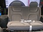1996 Ford Bronco - The rear seat of a vehicle is shown with seatbelts fastened.