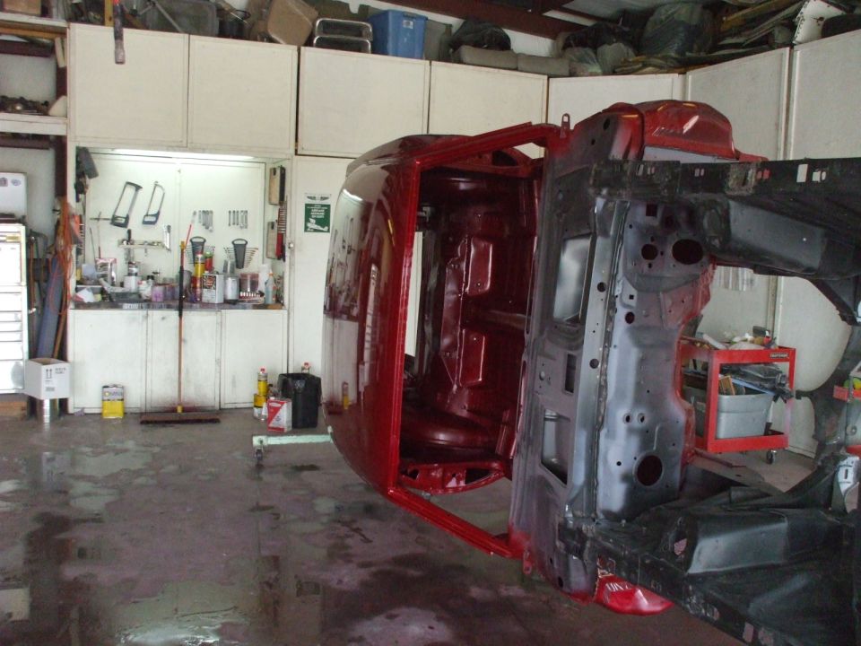 Good shot of the new cowl and firewall.  I think I'm going to paint both red, and leave the inner fenders black.