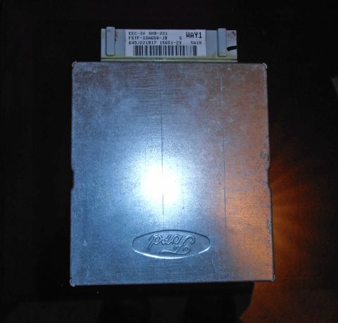 1990 Ford Bronco - This Ford engine control module, identified by part number F5TF-12A650-JB, is a component for a vehicle.