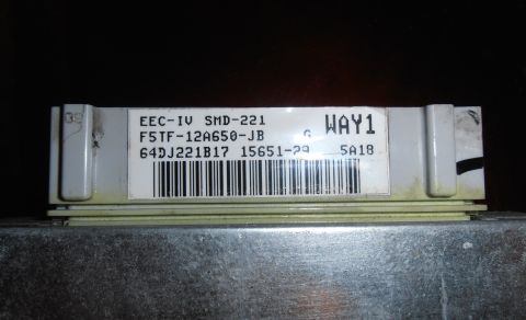 1990 Ford Bronco - Close-up of a Ford EEC-IV engine control module, part number F5TF-12A650-JB.