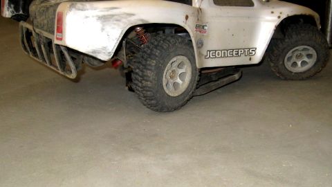 1996 Ford Bronco - This remote control truck features aggressive off-road tires and a prominent JCONCEPTS decal on its side.