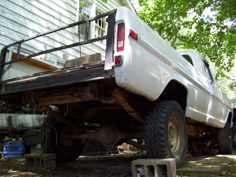 1972 Ford F-150 - This 1972 Ford F-150 pickup truck is shown from the rear with a flatbed attachment.