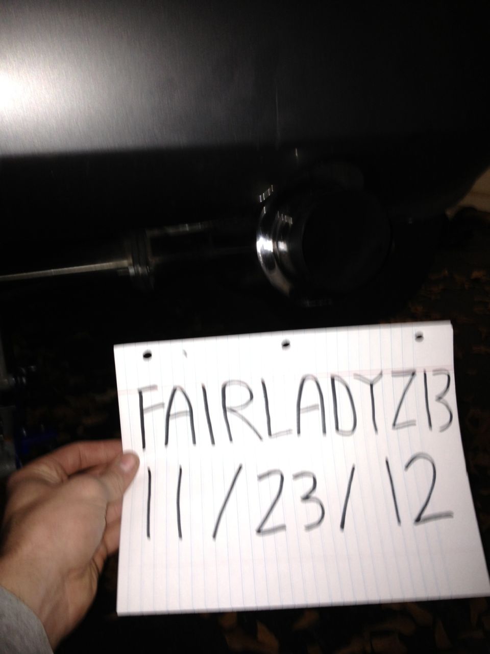 exhaust pipe and muffler with handwritten note 'FAIRLADY ZIB 11/23/12'