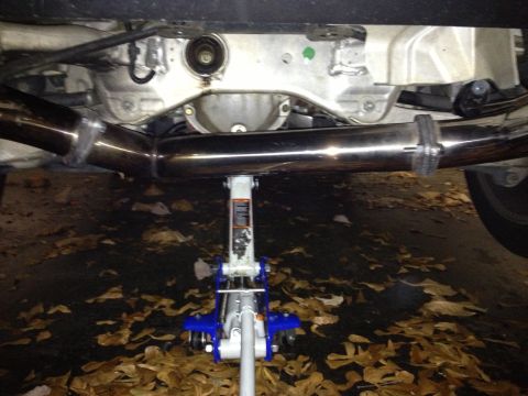 1996 Ford Bronco - Close-up view of a vehicle's undercarriage, showing the exhaust system and differential.