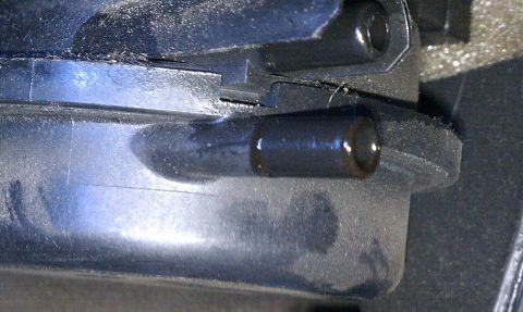 2000 GMC Jimmy - Detail of an automotive part, possibly from a 2000 GMC Jimmy, showing a small tube.