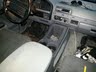 1994 Ford Bronco - Interior view of a car's dashboard and center console.
