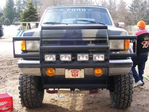 1996 Ford Bronco - Front view of a 1996 Ford Bronco equipped with a bull bar and large off-road tires.