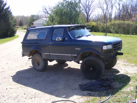 1996 Ford Bronco - This Ford Bronco appears to be from the early to mid-1990s, likely a 1992 model, based on its body style.