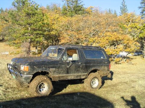 1988 Ford Bronco - This Ford Bronco appears to be from the late 1980s, likely a 1987 model, seen off-roading.