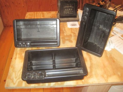 1993 Ford Bronco - These storage trays appear to be aftermarket parts, not original equipment for a 1993 Ford Bronco.