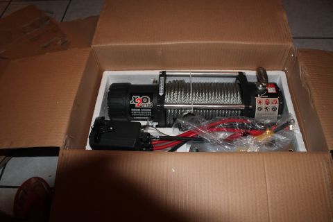 1990 Ford Bronco - New winch arrived in the mail, ready for installation.