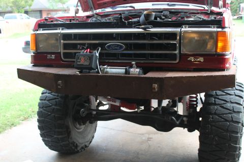 1990 Ford Bronco - Front view of a 1990 Ford Bronco showing its custom bumper and winch setup.