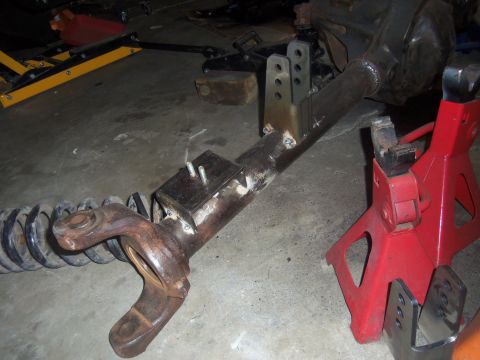1968 Ford Bronco - This is a custom-built axle assembly, likely for off-road modification, with a coil spring and suspension parts.