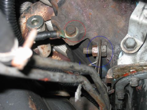 1992 Ford Bronco - This photo shows a close-up view of a ground wire connection on an engine component.