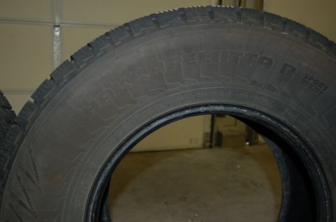 2000 Subaru Forester - A close-up view of a tire, showing tread detail and brand markings.